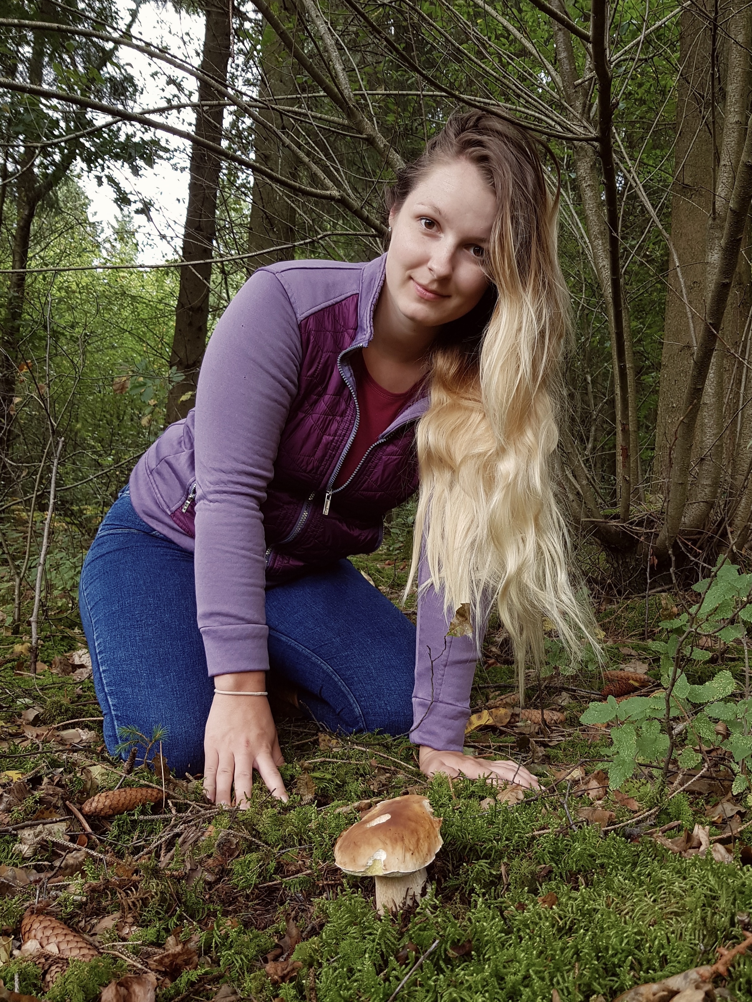 photo of marina with a boletus edulis mushroom in the forest